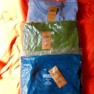 Three Duluth Trading LongtailT shirts with washBLU sizeXLG.$12 Dollars each one